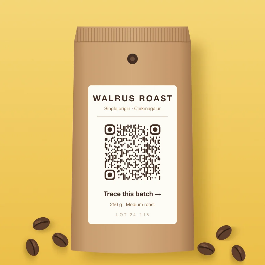 Kraft coffee pouch with a white label and a bar-style QR code captioned “Trace this batch”